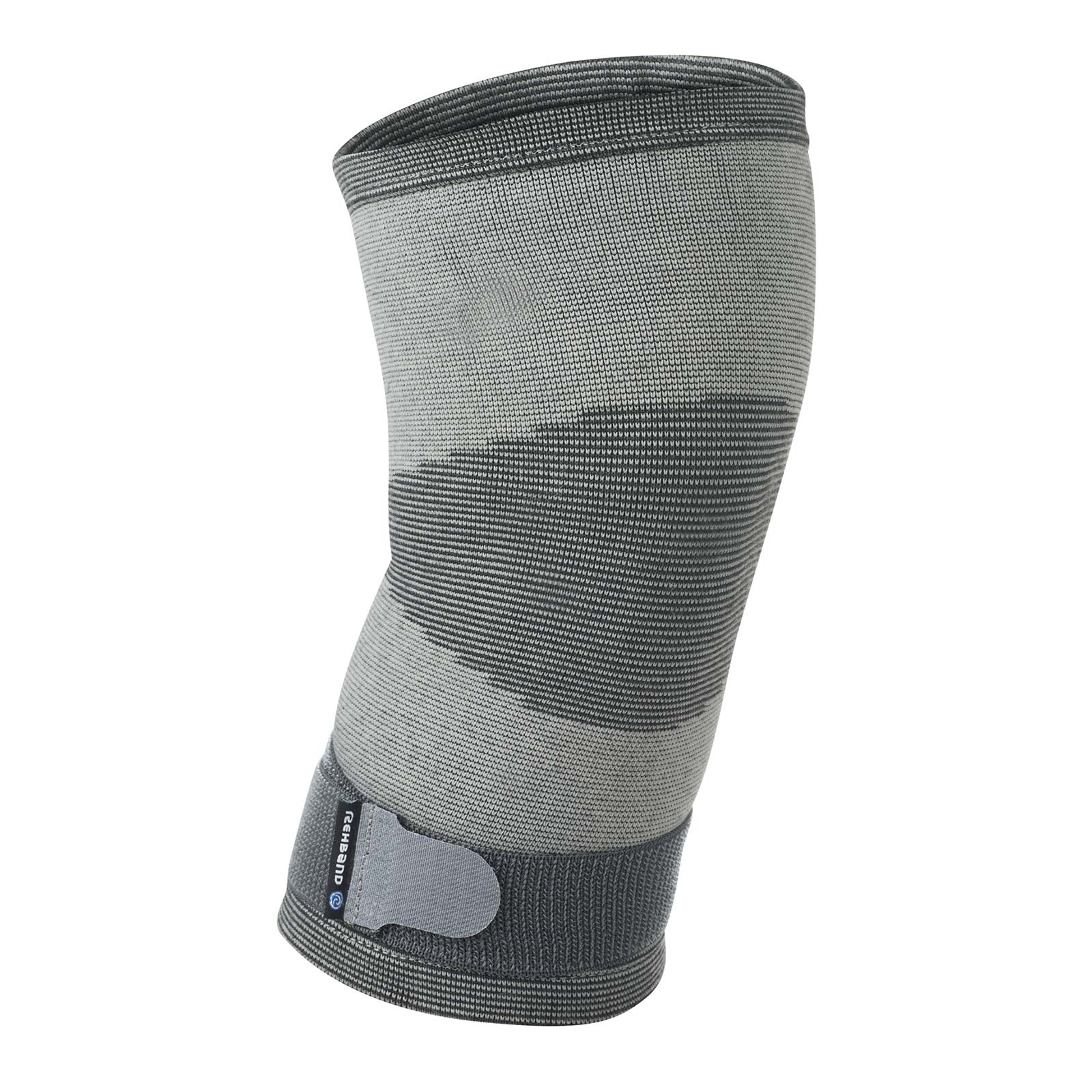 A grey knitted knee sleeve with an adjuster at the bottom